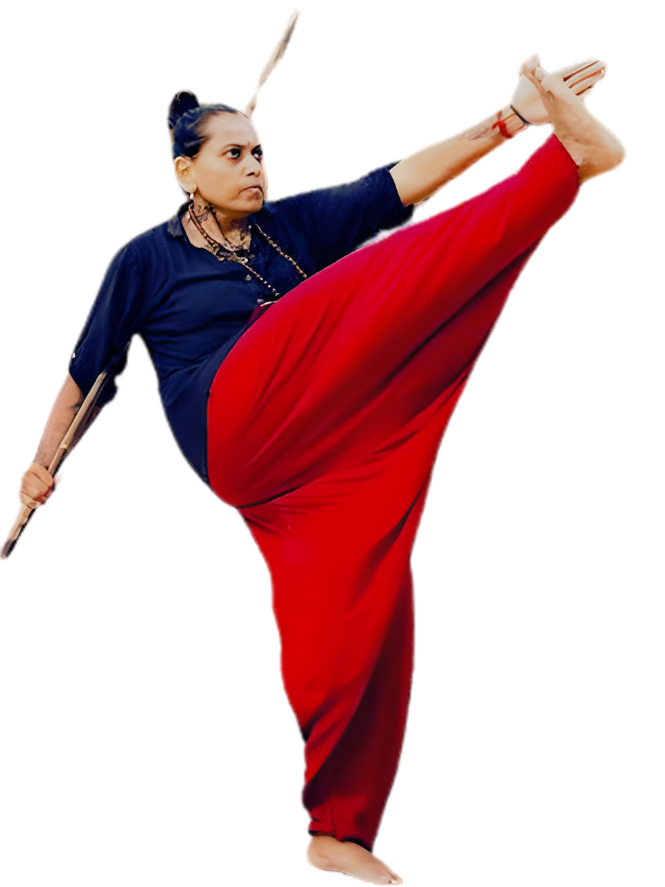 Rathi Priya performing a standing high kick